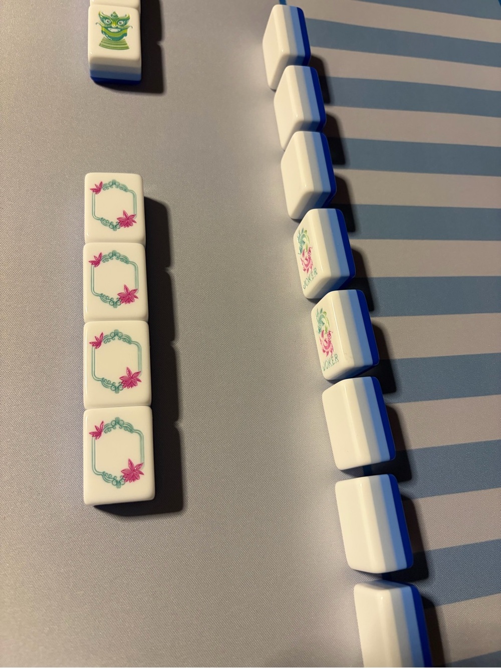 Engraved 160 mahjong tiles with blues, gray, white.